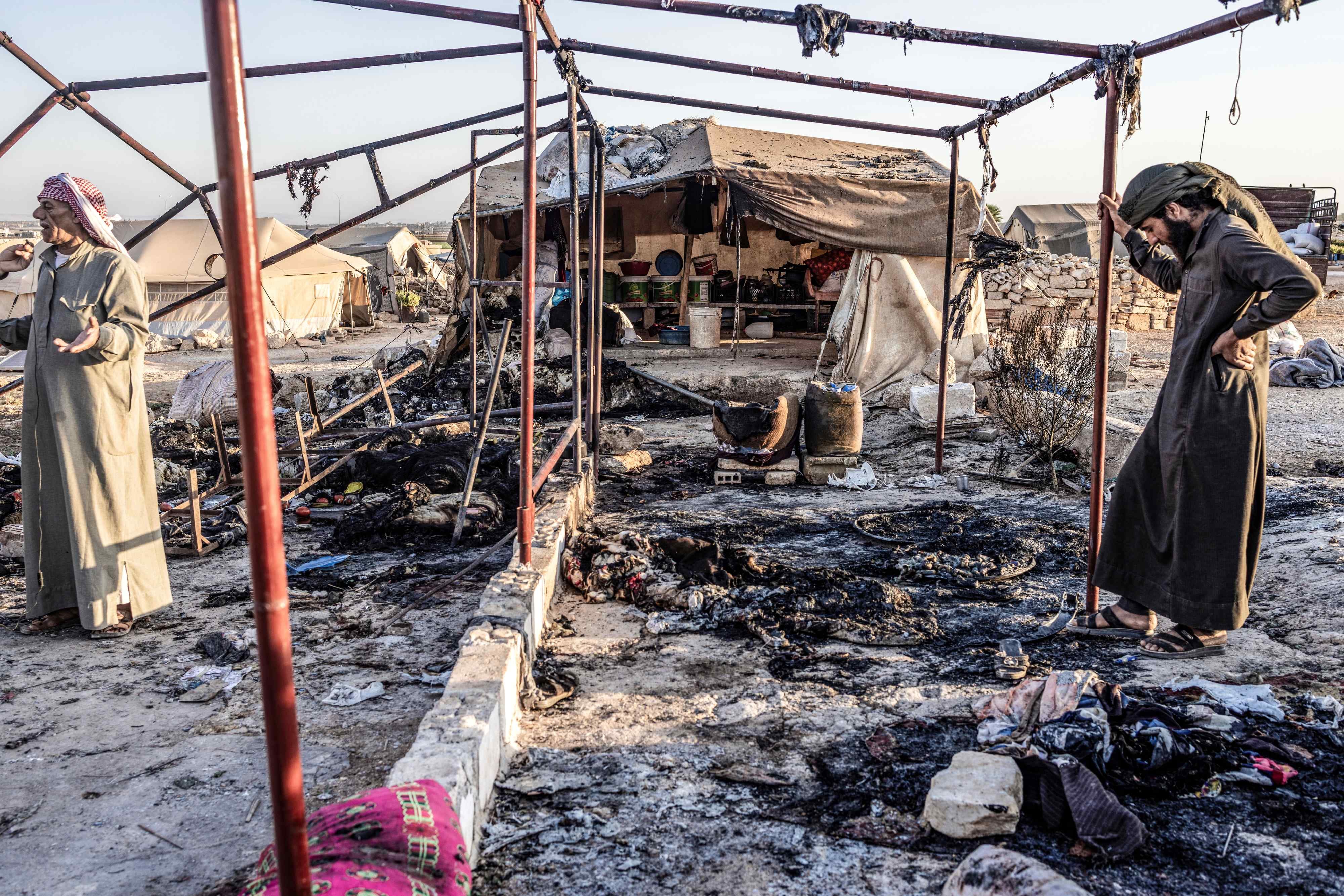 A destroyed tent can be seen as a result of a missile attack targeted a camp for displaced people on the outskirts of Idlib city by the Syrian government. © 2023 Anas Alkharboutli/picture-alliance/dpa/AP Images