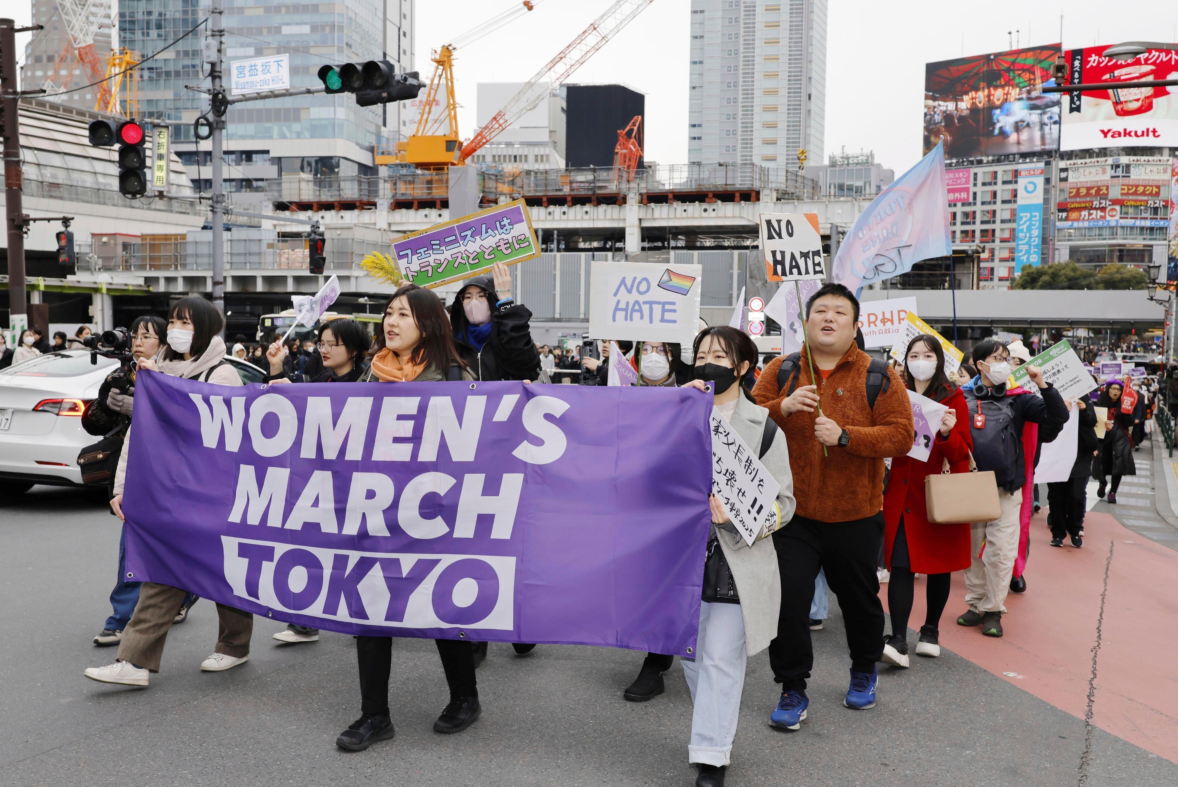 People march in an International Women's Day demonstration