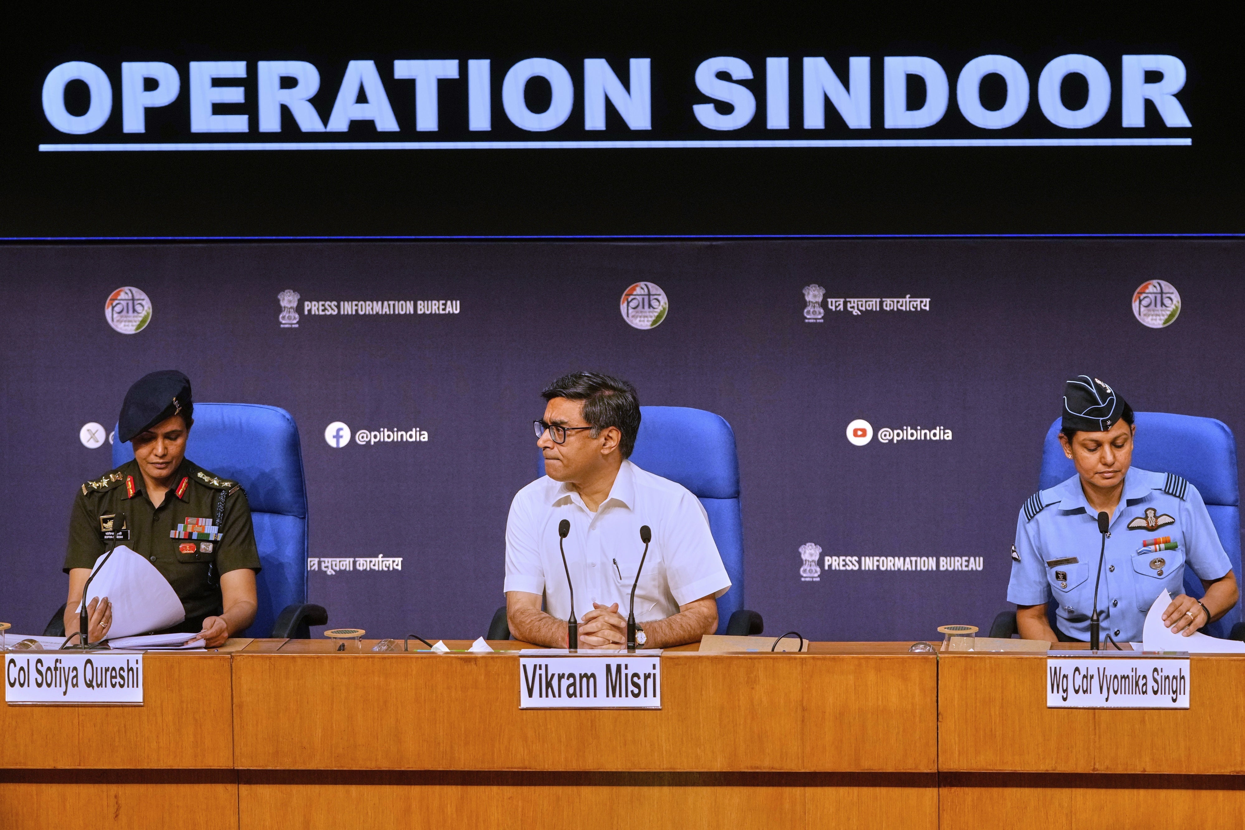 Indian army officer Col. Sofia Qureshi (L), India's Foreign Secretary Vikram Misri (C) , and Indian air force officer Wing Commander Vyomika Singh address a press conference after India carried out missile strikes in Pakistan, in New Delhi, India, May 7, 2025.