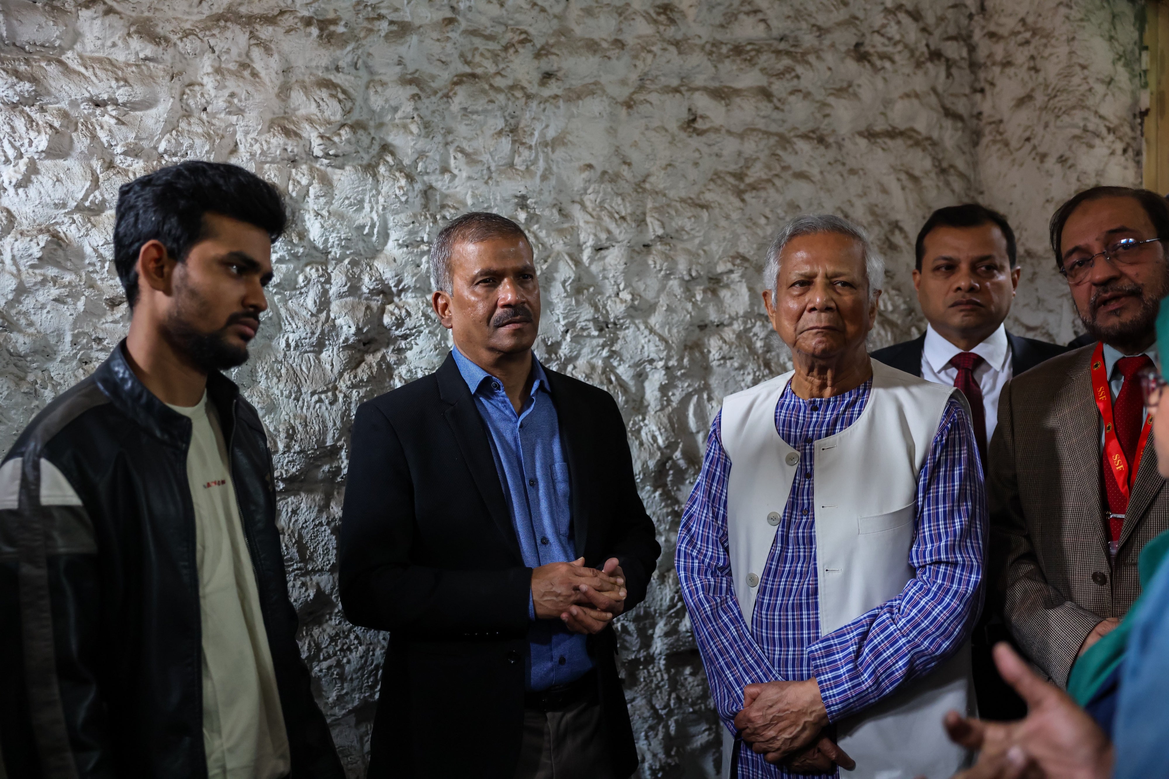 Chief Advisor Muhammad Yunus (3rd L) visits three secret detention facilities known as "Ayna Ghor," which had been used as torture cells during the Awami League government's rule, Dhaka, Bangladesh, February 12, 2025.