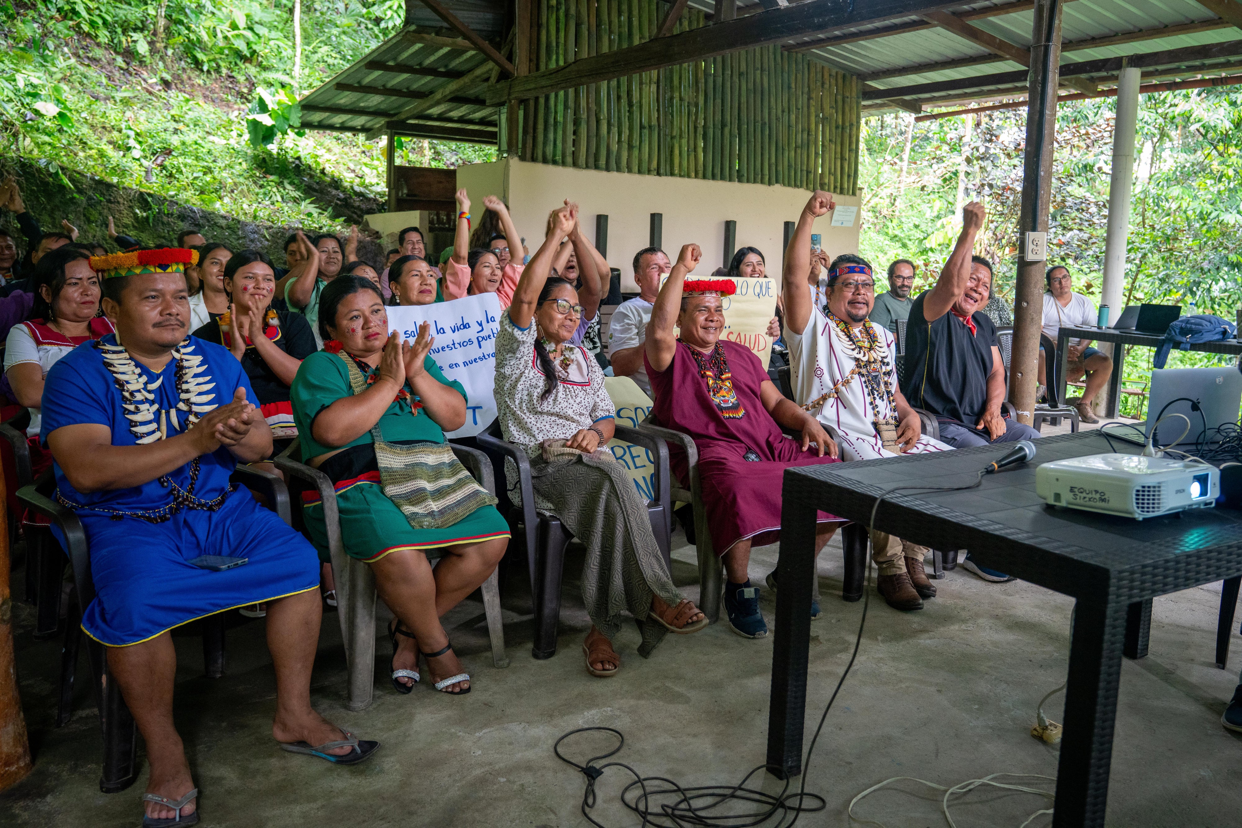 Members of Alianza Ceibo, belonging to the Siekopai, A’i Cofán, Siona, and Waorani Indigenous communities, attend a virtual hearing where a decision was made to unfreeze their organization’s funds. 