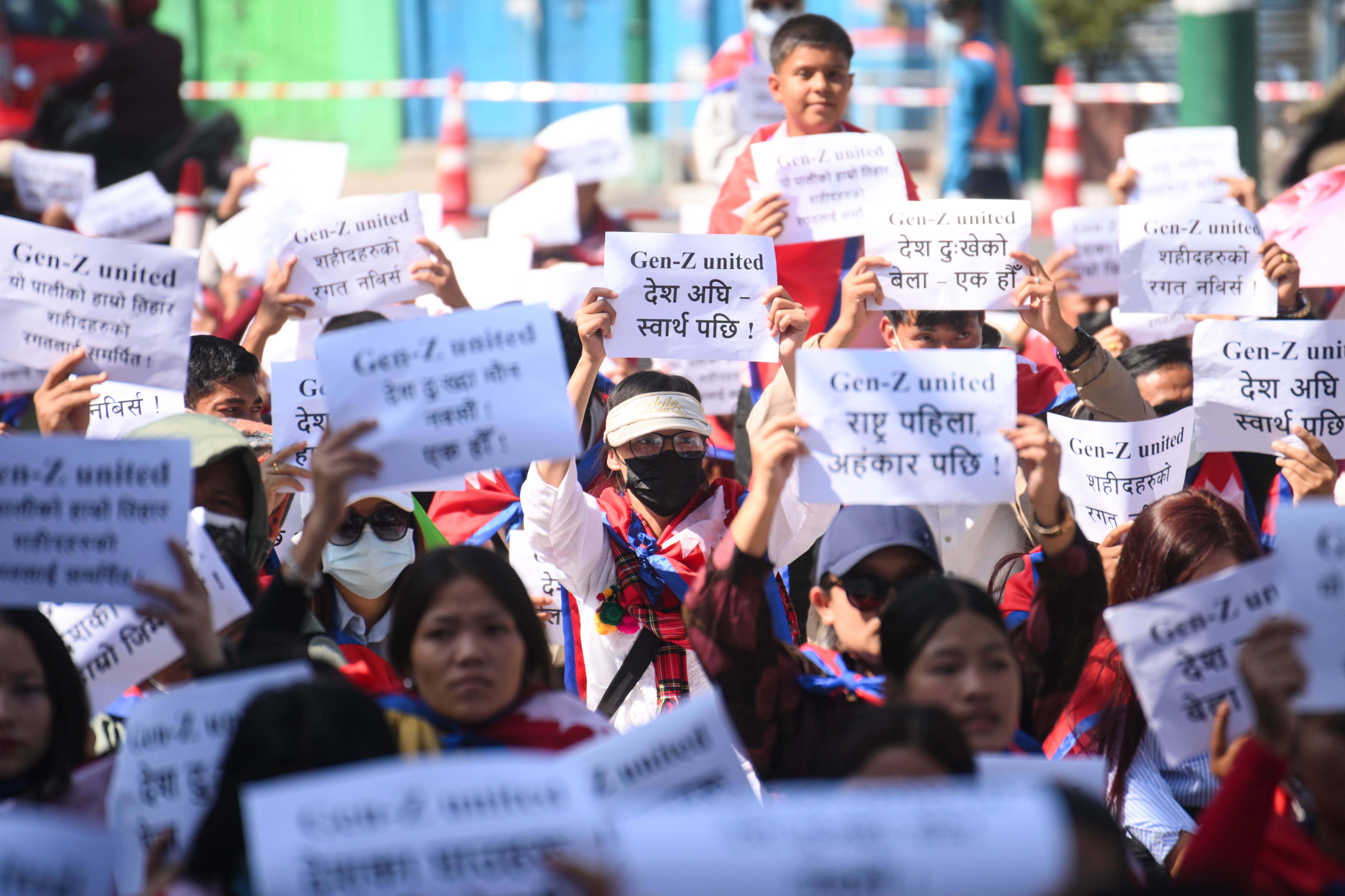 “Gen Z” activists hold a demonstration in Kathmandu, Nepal, in September 2025 under the slogan ''Don't Forget the Blood of Martyrs,'' demanding justice and accountability for those killed during past protest movements. 