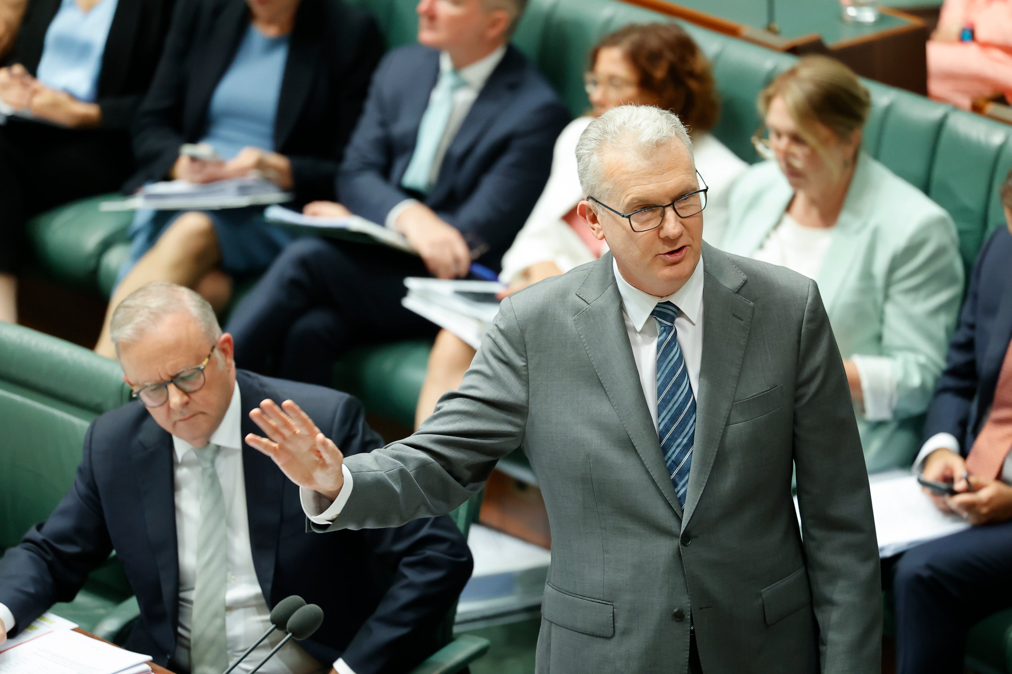 Minister for Home Affairs Tony Burke (right) addresses the chamber at Parliament House in Canberra, Australia, January 20, 2026. 