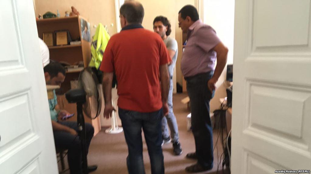 Journalists at Turan News Agency in Azerbaijan while tax police raided their office earlier this month. 