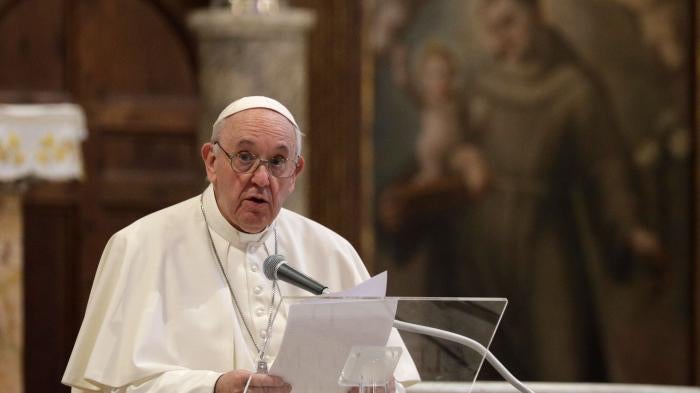 Pope Francis attends a inter-religious ceremony for peace in the Basilica of Santa Maria in Aracoeli, in Rome, October 20, 2020. 