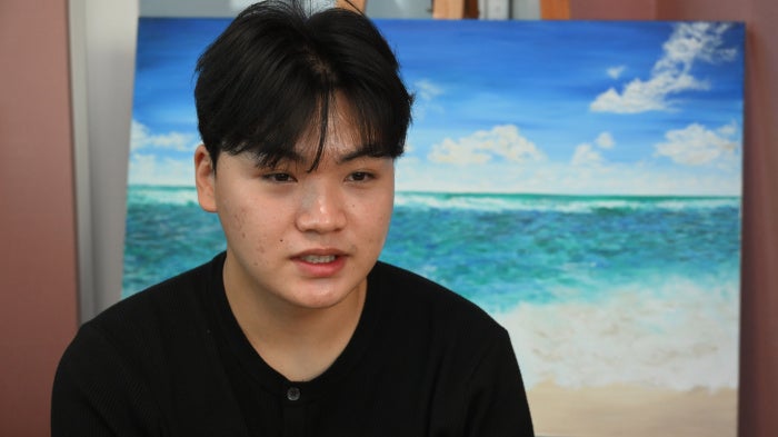 Kim Geum Sung at home in Seoul, South Korea, talking about his mother, who is detained in China.