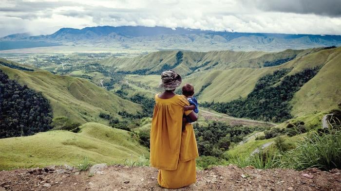woman holding a child