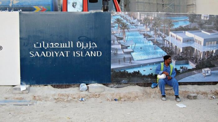 A construction worker after the end of his shift on Saadiyat Island. In spite some improvements in the working conditions of migrant workers on the island, abuses continue.