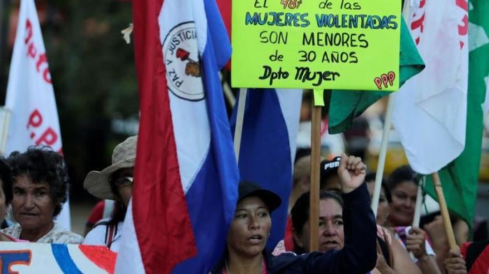 Paraguayan social activists protest in front of the Health Ministry to demand the end of violence against women and better health care for women, as the world celebrates "International Women's Day" in Asuncion, Paraguay, March 8, 2017. 