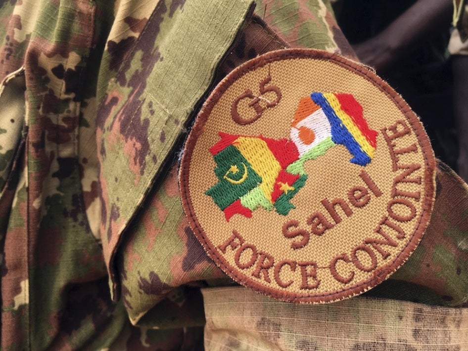A soldier stands guard in front of the G5-Sahel Counter Terrorism Force headquarters in Mali, May, 30, 2018. 
