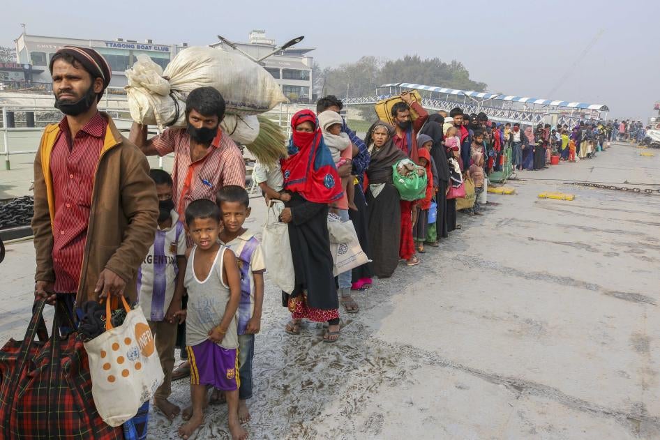 Rohingya refugees headed to the Bhasan Char island prepare to board navy vessels from the south eastern port city of Chattogram, Bangladesh on Feb.15,2021. © 2021 AP Photo 