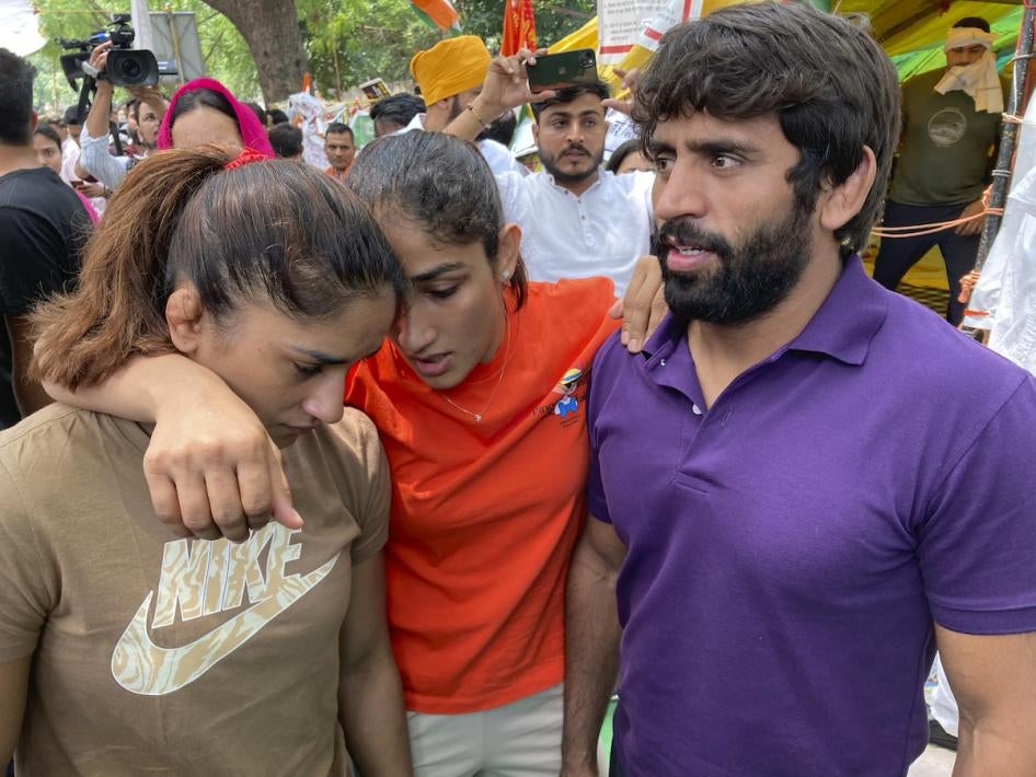 Indian wrestlers, from right, Bajrang Punia, Sangita Phogat and Vinesh Phogat, ahead of their protest march towards the newly inaugurated parliament, in New Delhi, India, May 28, 2023. 