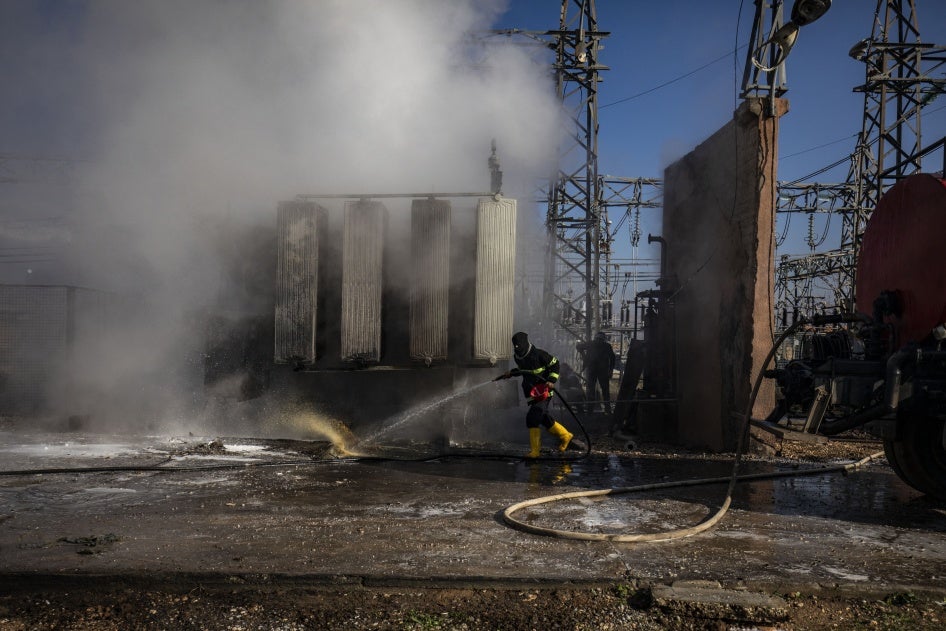Syrian Kurdish firemen put out a blaze at a power station in Qamishli which was reportedly targeted by Turkish drones on January 15, 2024. 