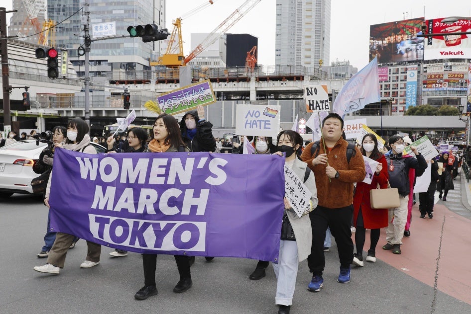 People march in an International Women's Day demonstration