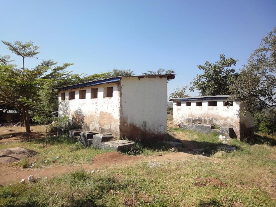 Female and male latrines at a secondary school in Mwanza, northeastern Tanzania. Many students told Human Rights Watch that they had to use dirty and congested pit latrines. 