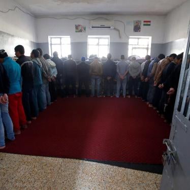 Teenagers stand inside a prison cell at a reform centre in Dohuk, Iraq, February 12, 2017. 