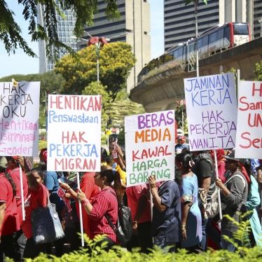 A group holding protest signs