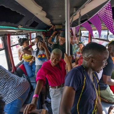 People on a bus among the thousands participating in the 30th Gay Pride event in Johannesburg, South Africa, October 26, 2019. ©2019 AP Photo/Jerome Delay