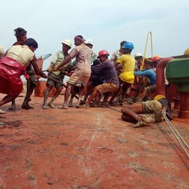Workers dismantling a ship without adequate protective equipment in Chattogram Bangladesh.