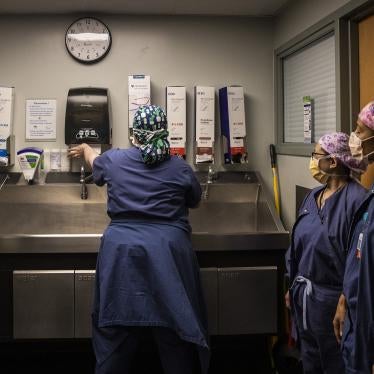 Surgical Technicians wash their hands after exiting an operating room at Newton-Wellesley Hospital in Newton, Massachusetts, US on April 22, 2022. 