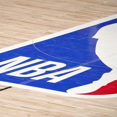 The NBA logo at center court. 