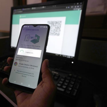  A person waits to connect to WhatsApp as the internet runs slow, in Karachi, Pakistan, August 19, 2024. 