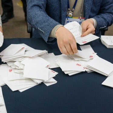 Officials demonstrate ballot counting during a simulation of election procedures for the presidential election at South Korea's National Election Commission in Gwacheon, April 10, 2025.