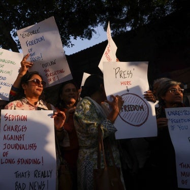 Members of the media protest a police raid on the office of a news portal and homes of journalists and writers linked to it, at the Press Club in New Delhi, India, October 4, 2023.