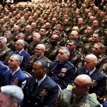 Members of the military attend a meeting convened by US Defense Secretary Pete Hegseth, at Marine Corps Base Quantico, in Quantico, Virginia, September 30, 2025.