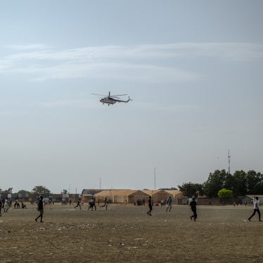 A UN helicopter performs a routine patrol over the Bentiu internally displaced persons camp in Unity State, South Sudan, on November 4, 2025.