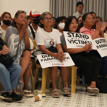 Families of victims of the “war on drugs” watch a live stream 