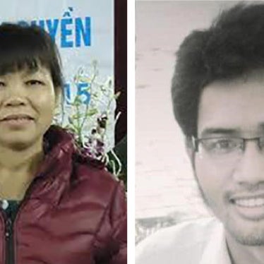 Can Thi Theu (left) and Le Huu Minh Tuan.