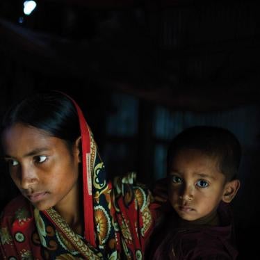 Belkis, 15 years old, holds her one-year-old son in the house where she lives with her mother, two sisters, and one brother. Belkis was married when she was 13 years old to a man who threatened to commit suicide if the family didn’t agree to the marriage.