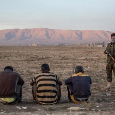 Three suspected ISIS members who travelled alongside families escaping areas around Mosul recently retaken from the group are held by KRG’s security forces at a checkpoint east of the city. November 4, 2016. 