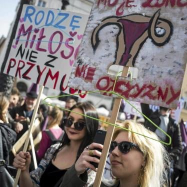 Protesters hold coathangers to illustrate the danger to women’s safety posed by an outright ban on abortion © Reuters
