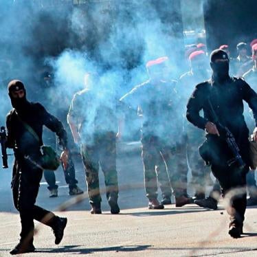 Iraqi security forces fire tear gas to disperse protesters during a demonstration in Baghdad, Iraq, Friday, Oct. 25, 2019. 