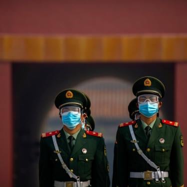 Chinese paramilitary police wear face masks in Beijing, May 1, 2020.